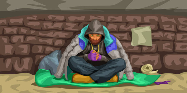 homeless man sitting at wall