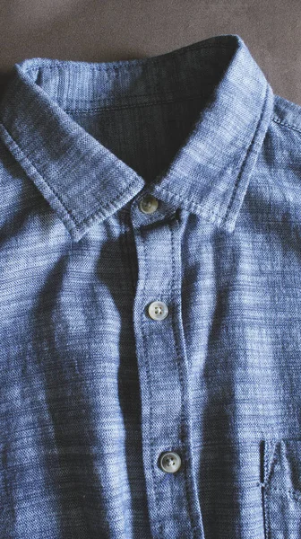 Close up of blue shirt collar casual