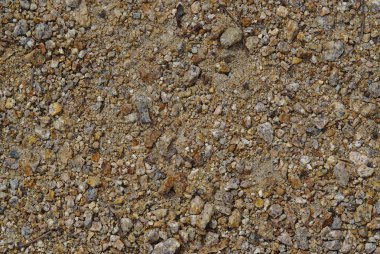 Kum ve çakıl ışık gri ve kahverengi renklerde tam kare görünümü