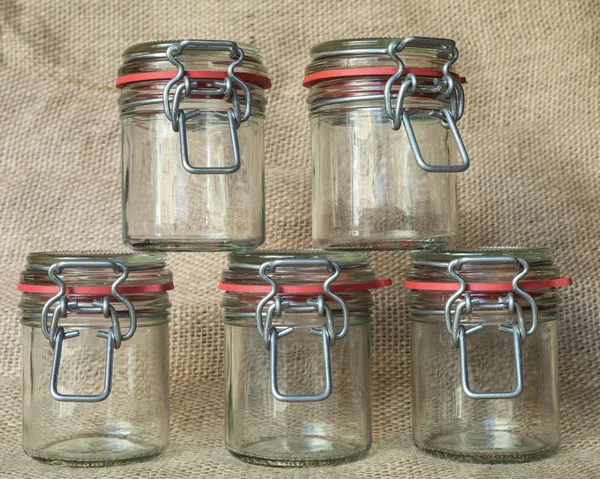 Five emty glass jars