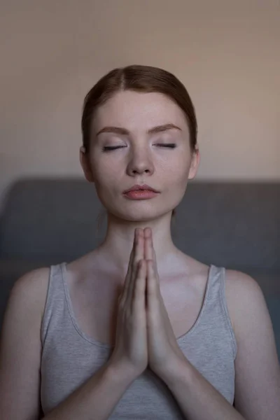 Close Young Woman Meditating Joined Hands Living Room — Stock Photo, Image