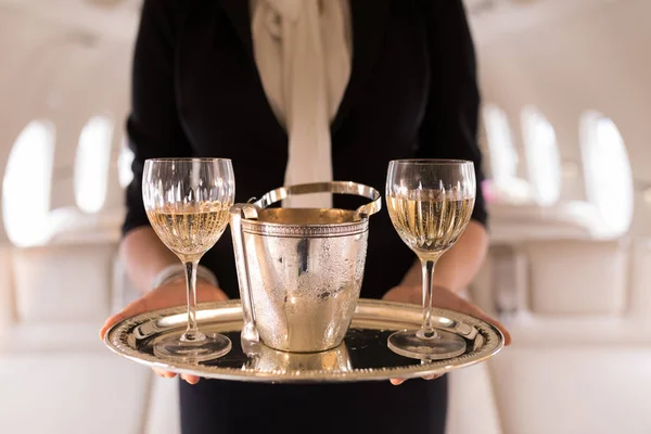 Mid Section Flight Attendant Serving Glasses Champagne Private Jet — Stock Photo, Image