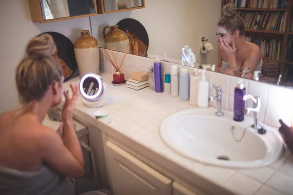 Woman Applying Facial Cream Bathroom Home — Stock Photo, Image