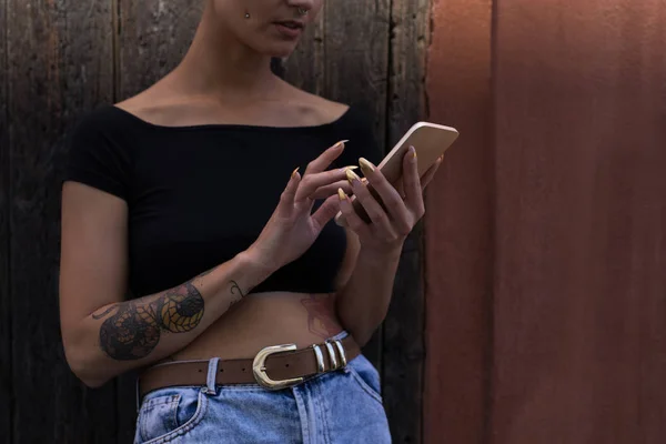 Mid Section Young Adult Woman Using Mobile Phone Front Wooden — Stock Photo, Image