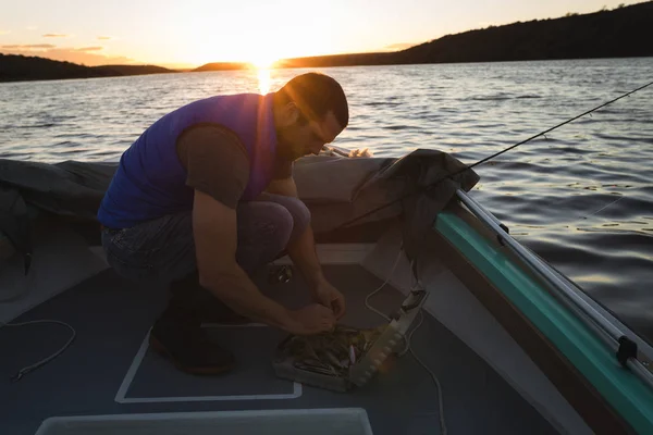 Man Preparing Bait Fishing Motorboat — Stock Photo, Image