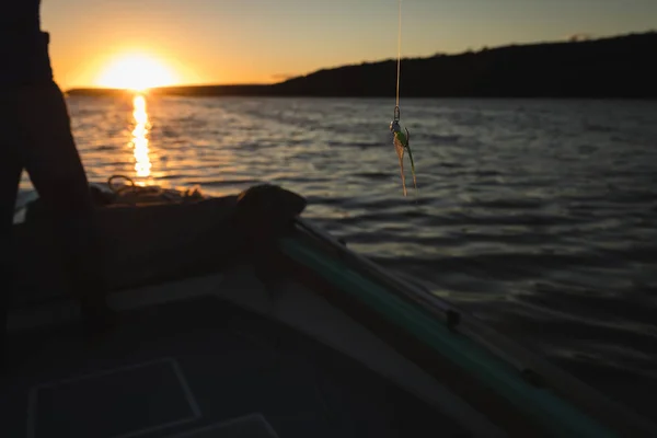 Cropped View Man Fishing While Standing Motorboat River Sunset — Stock Photo, Image