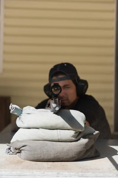 Man Aiming Sniper Rifle Target Shooting Range Sunny Day — Stock Photo, Image