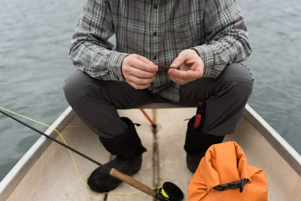 Man Holding Bait His Hands While Sitting Boat — Stock Photo, Image