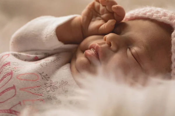 Newborn Baby Rubbing Eye Fluffy Blanket — Stock Photo, Image