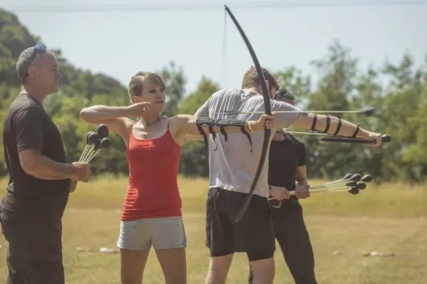 Trainer Instructing Woman Archery Boot Camp — Stock Photo, Image