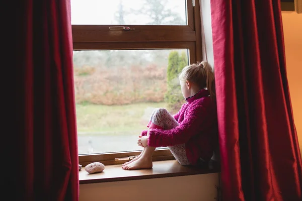 Thoughtful Girl Sitting Window Sill Home — Stock Photo, Image