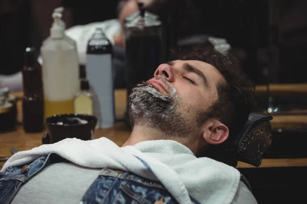 Man Shaving Cream Beard Relaxing Chair Barber Shop — Stock Photo, Image