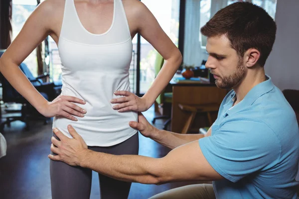 Physiotherapist Correcting Position Female Patient Clinic — Stock Photo, Image