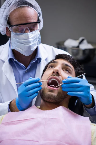 Dentist Examining Patient Tools Dental Clinic — ストック写真