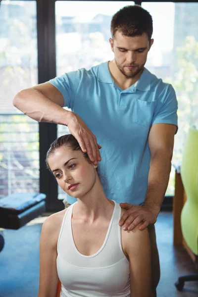 Physiotherapist Stretching Neck Female Patient Clinic — Stock Photo, Image