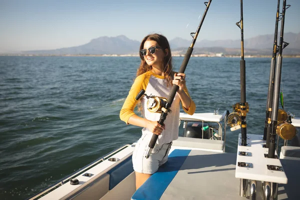 Sport fishing girl Stock Photos, Royalty Free Sport fishing girl