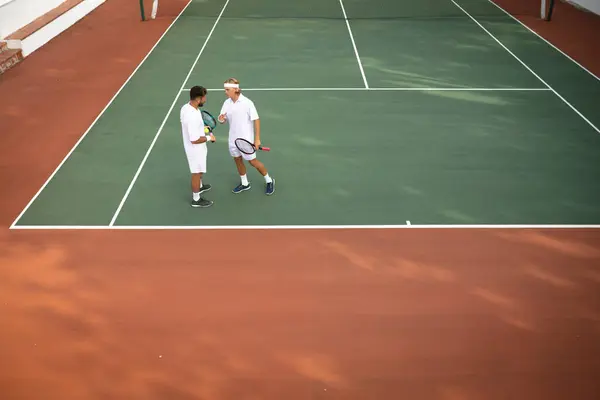Caucasian Mixed Race Men Wearing Tennis Whites Spending Time Court — Stock Photo, Image