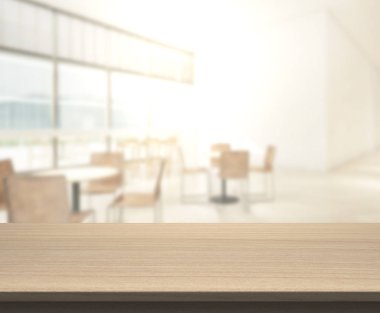 Arka plandaki masa üstü ve bulanık restoran