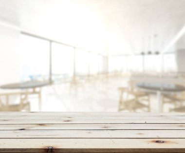 Arka plandaki masa üstü ve bulanık restoran