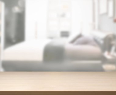 Masa üstü ve bulanıklık arka planda yatak odası