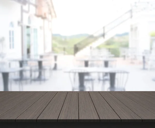 Bordsskiva och suddig restaurang med bakgrund — Stockfoto