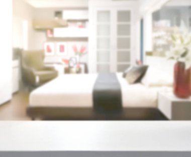 Masa üstü ve bulanıklık arka planda yatak odası