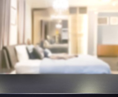 Masa üstü ve bulanıklık arka planda yatak odası