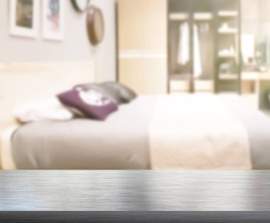 Masa üstü ve bulanıklık arka planda yatak odası