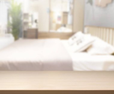 Masa üstü ve bulanıklık arka planda yatak odası