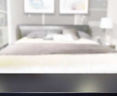 Masa üstü ve bulanıklık arka planda yatak odası