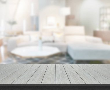 Masa üstü ve arka planın bulanık oturma odası