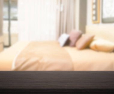 Masa üstü ve bulanıklık arka planda yatak odası