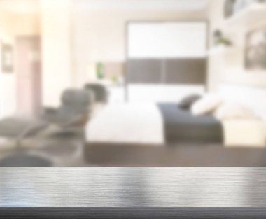 Masa üstü ve bulanıklık arka planda yatak odası