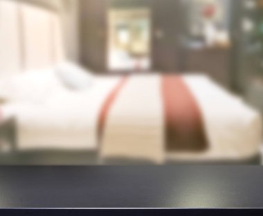 Masa üstü ve bulanıklık arka planda yatak odası