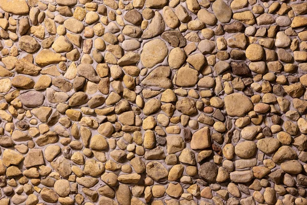 Wall decorated with stone, for background or texture, closeup wall built with natural stone, beautiful pattern and modern style — Stock Photo, Image