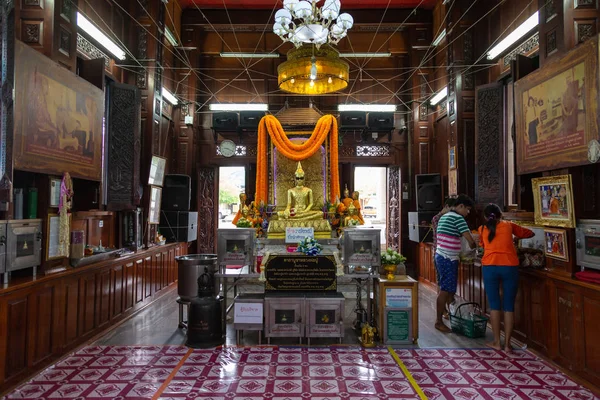 Samut Sakhon,Thailand-May 13,2019:Unseen Thailand,the ancient golden buddha statue wearing black glasses with dark lenses or sunglasses,is a place and sacred buddha image that is popular with local people and tourisits at Wat Krok Krak,travel in Samu — Stock fotografie