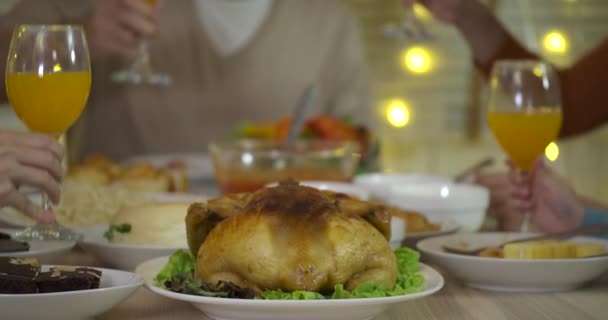 Happy Asian family enjoying christmas dinner together at home. — Stock Video