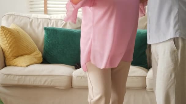 Happy senior couple dancing at home. — Stock Video