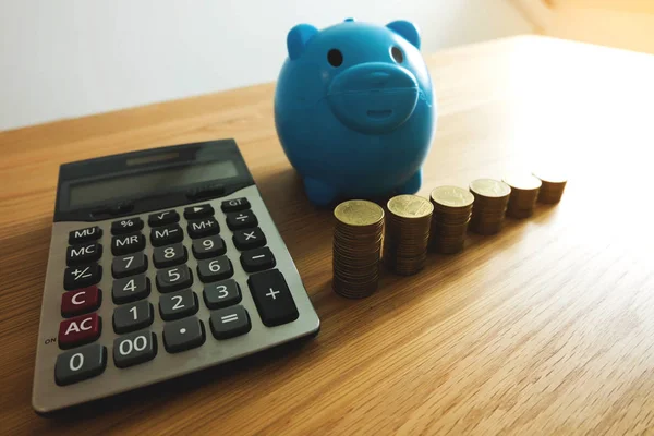 The blue piggy bank with business ,save money .finance concept .