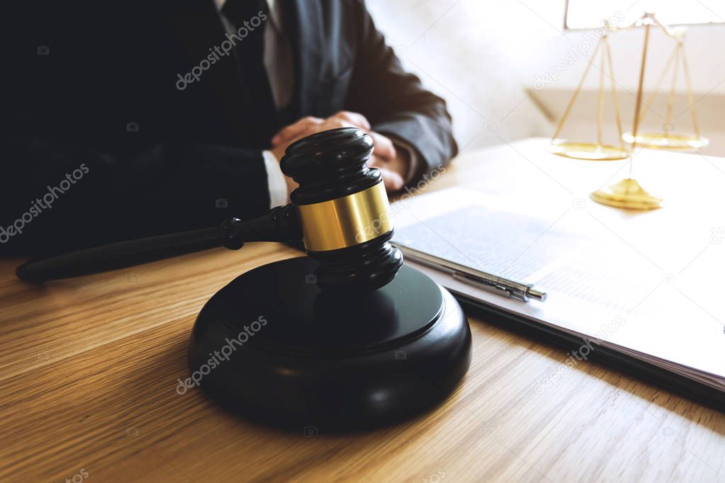 Lawyer working on the table in office. consultant lawyer, attorney, court judge, concept.