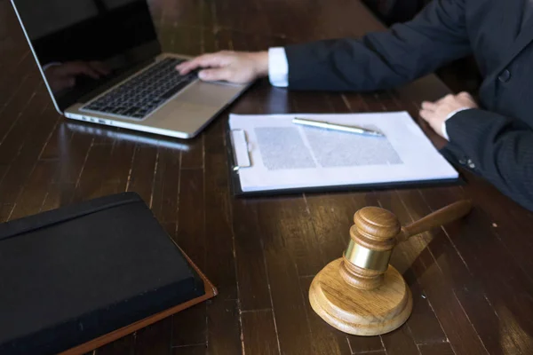 Lawyer working on the table in office. consultant lawyer, attorney, court judge, concept.