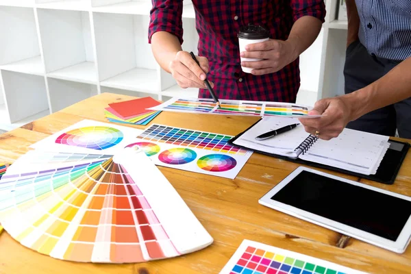 Graphic designers choose colors from the color bands samples for — Stock Photo, Image