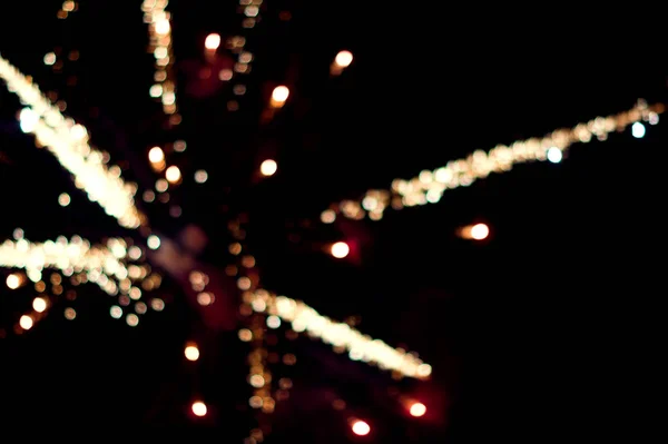 Hintergrund Des Feuerwerks Dunklen Nachthimmel Gelb Funkelt Und Leuchtet Vor — Stockfoto