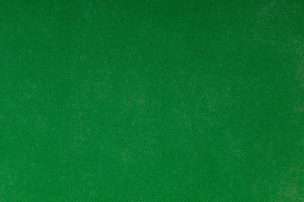 Background and texture of Christmas green felt.