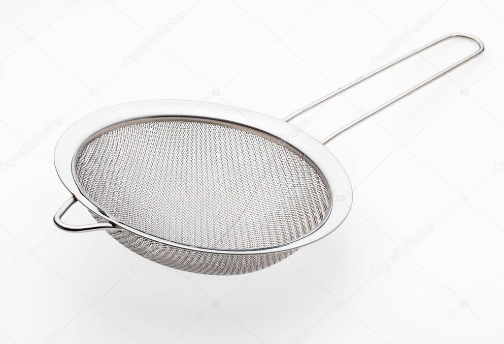 Metallic colander for cooking (kitchenware collection). Isolated on white background.