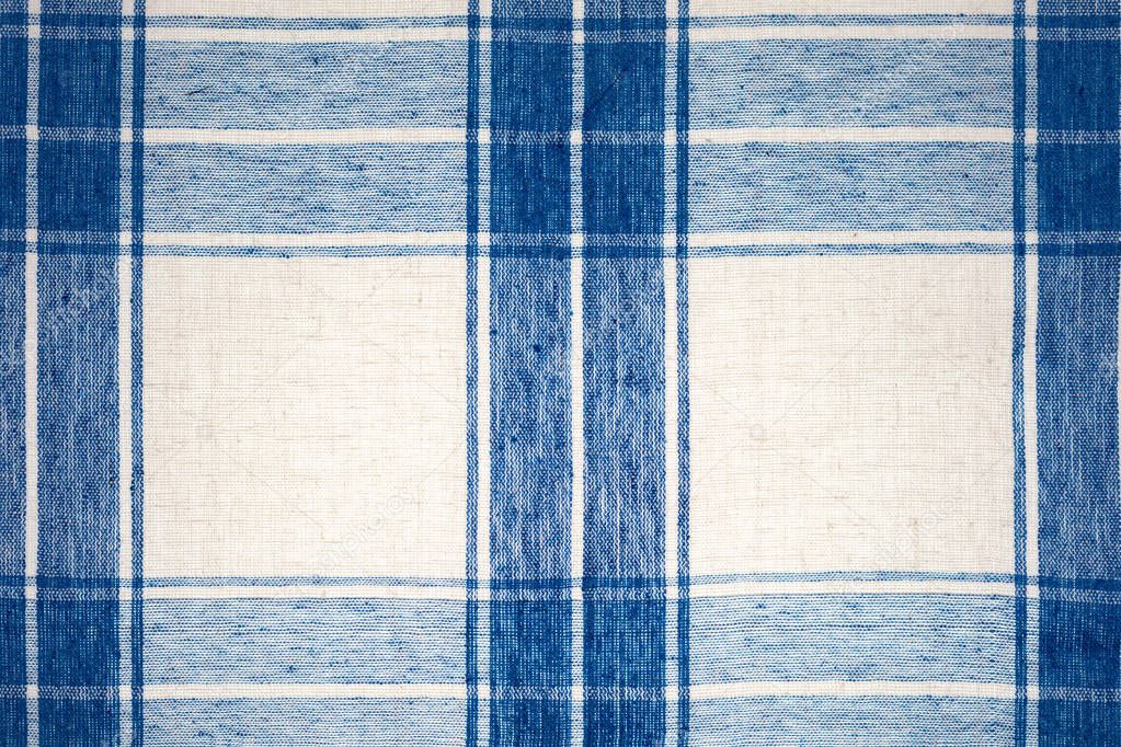 Tablecloth with blue and white squares. Home fabric.