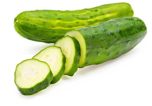 Cucumbers, whole and chopped, raw and fresh with drops of water. Isolated on white background. — Stock Photo, Image