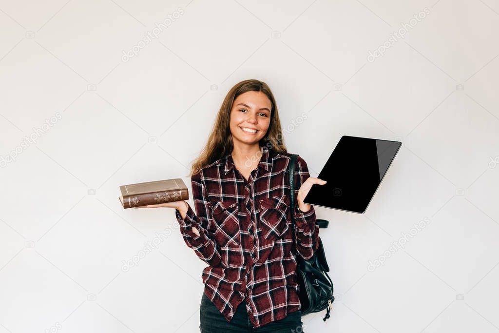 ebooks with book old with new paper book with electronic tablet student holding in her hands