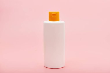 pembe arka plan kopyalama alanı üzerinde boş beyaz sıkma şişesi plastik tüp