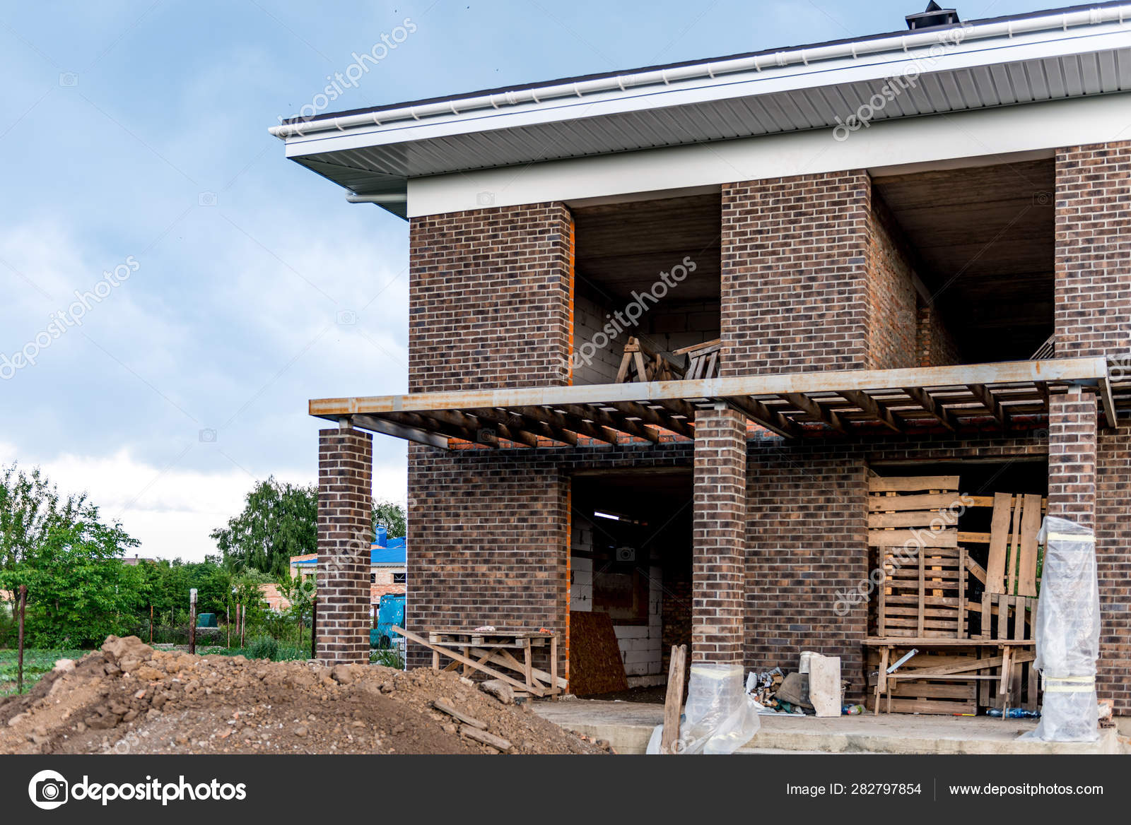 Roofing Construction And Building New Brick House With Modular